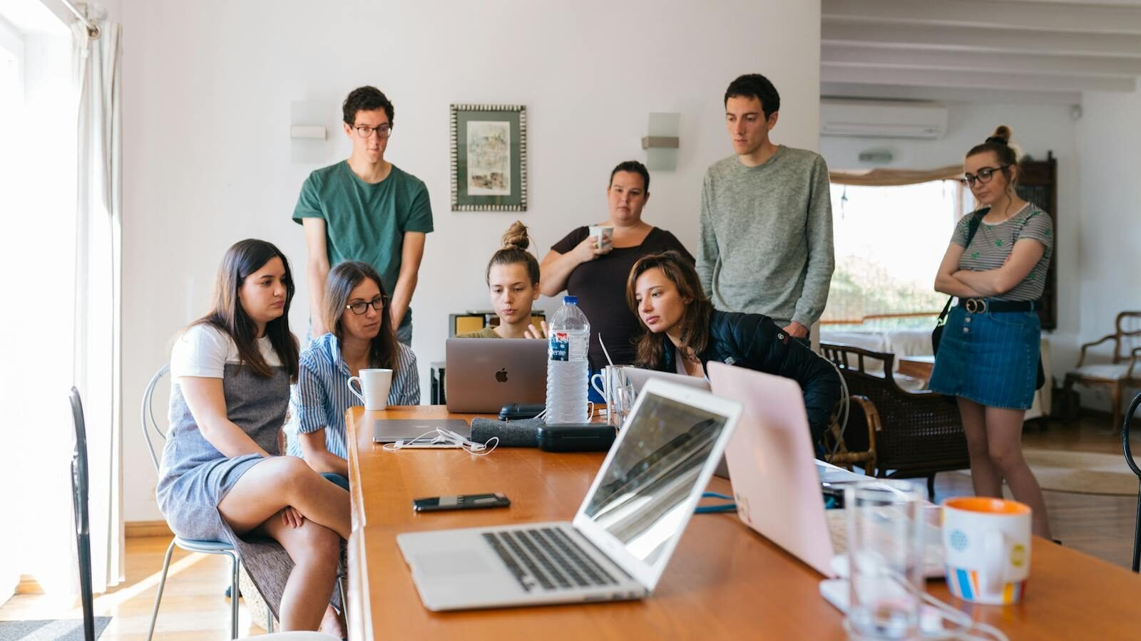 Group of People Watching on Laptop