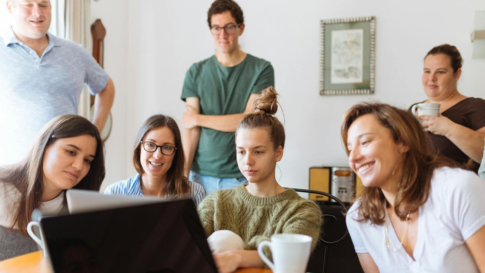 People Looking at Laptop Computer