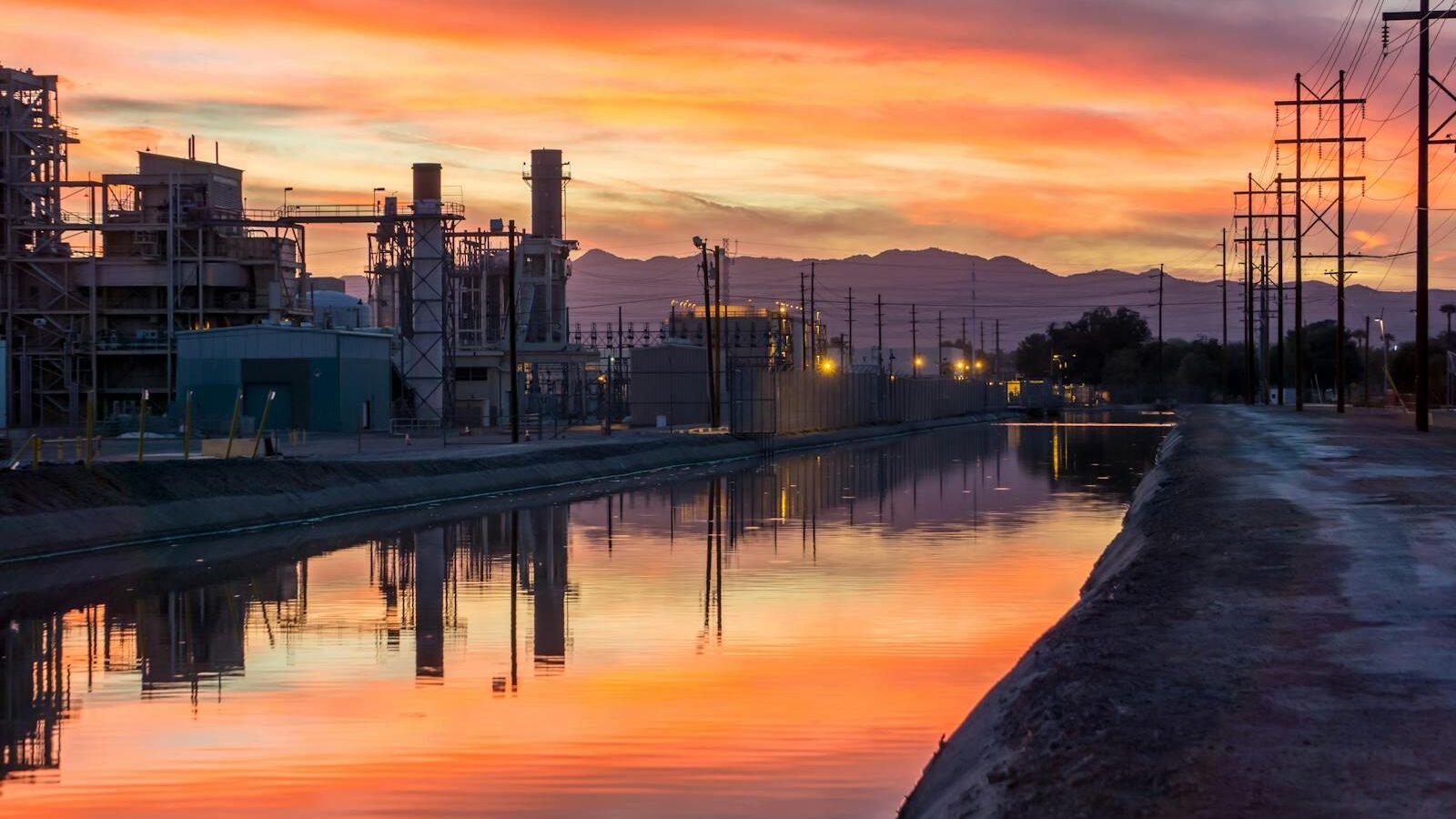 Photo of Building Near Body of Water during Golden Hour